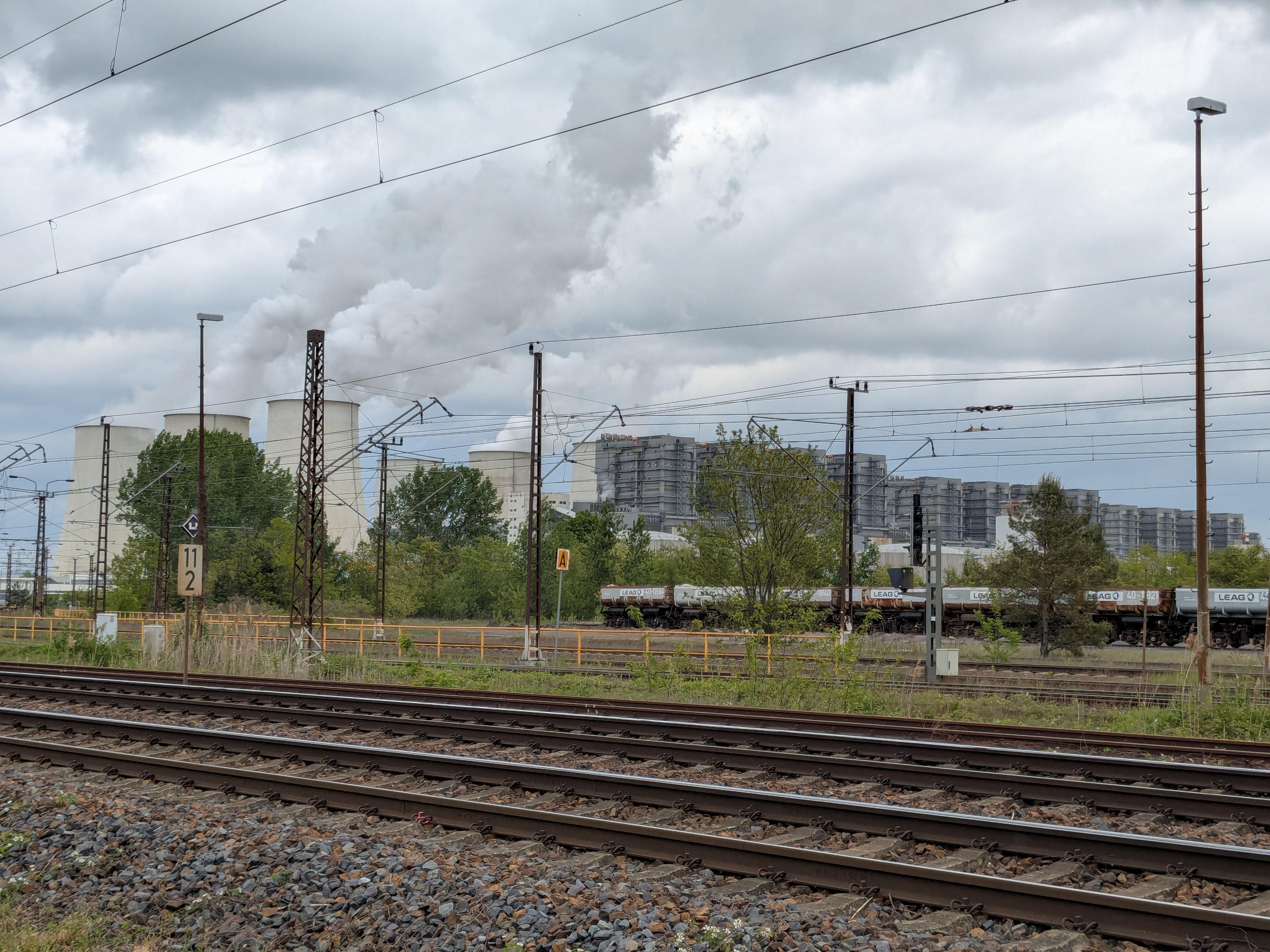 Photo shows train tracks in front of coal power plant Jänschwalde in Germany. Photo: CLEW/Wettengel.