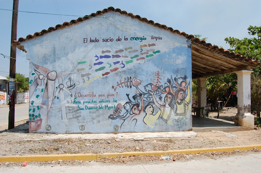 "The dirty side of clean energy” found on a wall in San Dionisio del Mar, Oaxaca, in the South of Mexico. Photo: Juan Mayorga