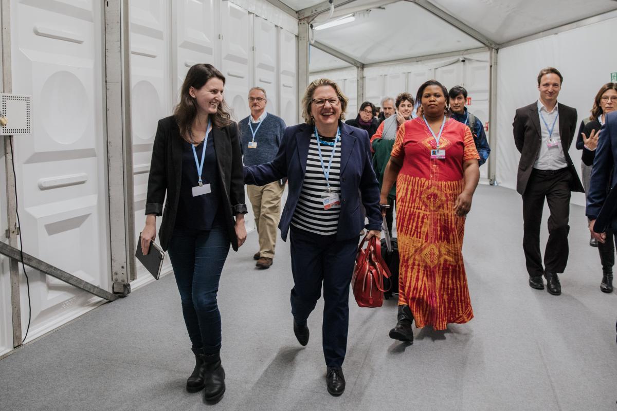 Germany's environment minister Svenja Schulze on her way to the Talanoa Dialogue: NGO's later pointed out that there is a gap between the picture Germany portrays at the COP and the lack of climate action at home. Photo: Sascha Hilgers, BMU.