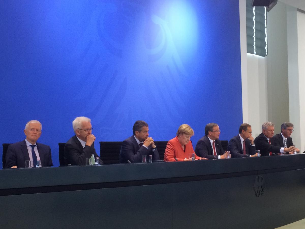 Merkel (centre) and Gabriel (3rd from left) at the second diesel summit. Photo:CLEW