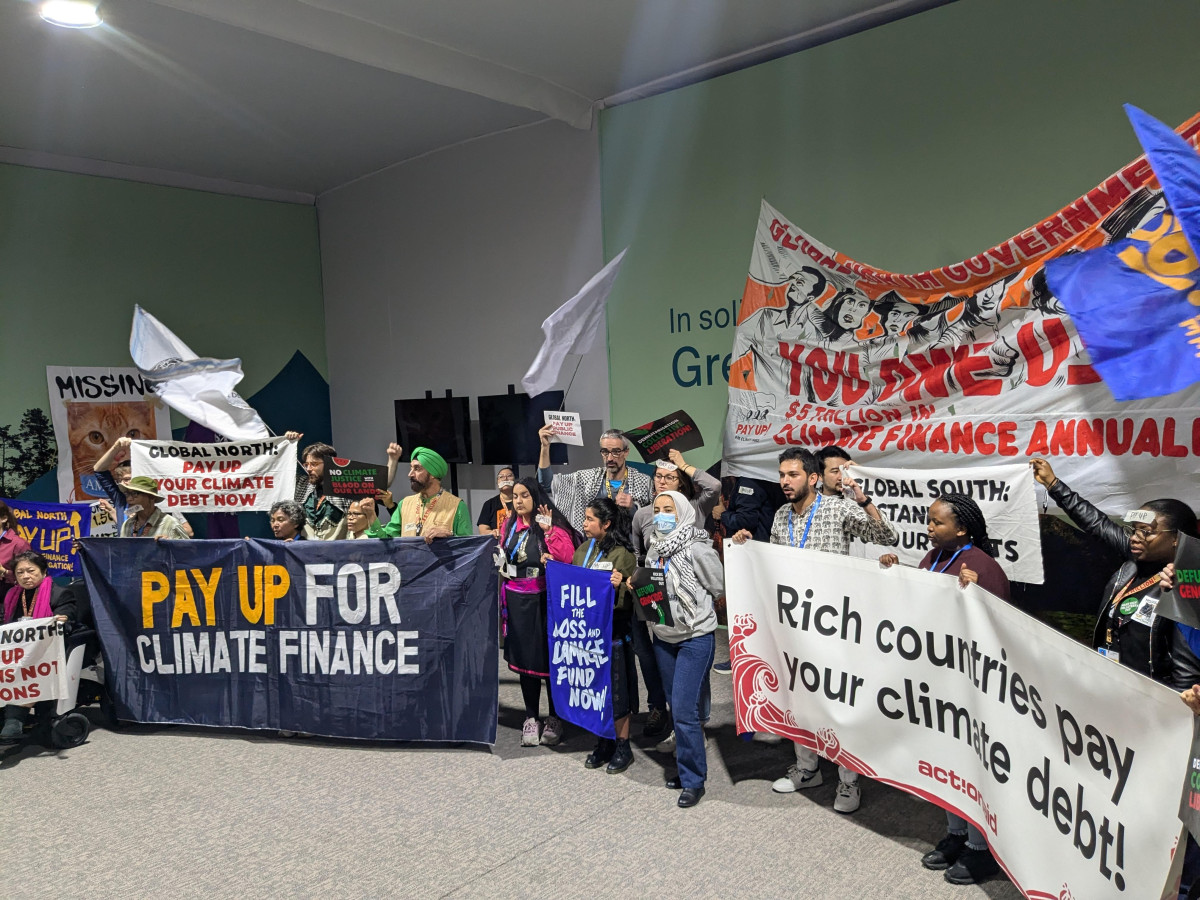 Protesters at the UN climate change conference COP29 in Baku, demanding rich countries "pay up". Photo: CLEW/Wettengel. 
