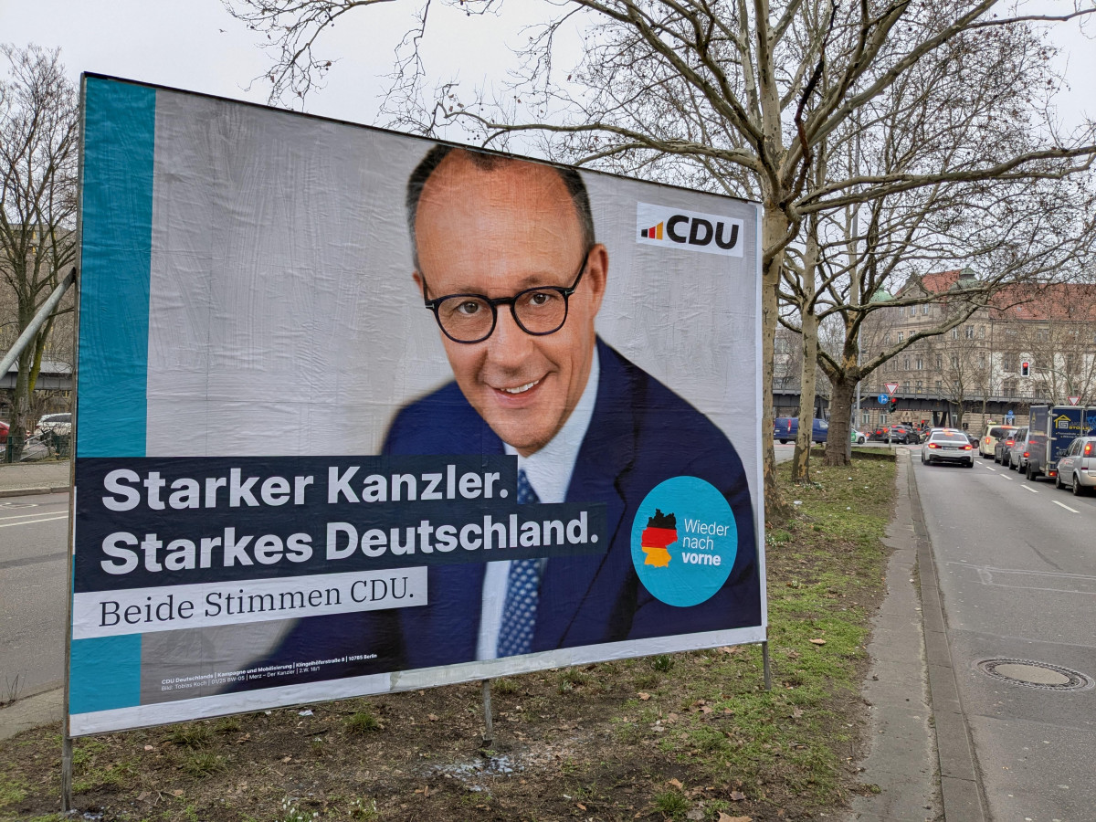 Picture shows election poster with German CDU leader Friedrich Merz. Photo: CLEW/Wettengel