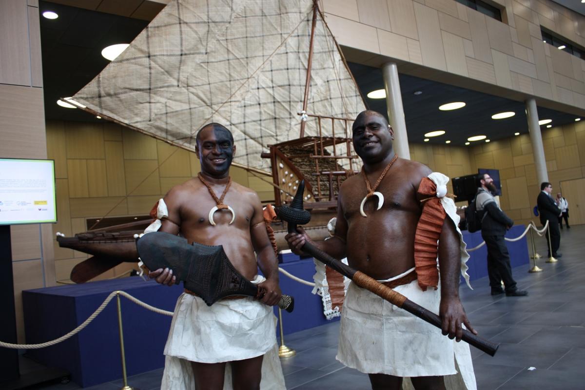 Fijian islanders in front of canoe at COP23 in Bonn, Germany. Source - CLEW 2017.