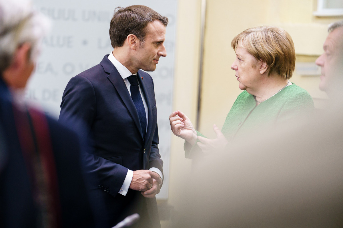 Photo shows French President Emmanuel Macron and German Chancellor Angela Merkel at the EU leaders summit in Sibiu, Romania. Photo: Bundesregierung/Denzel 2019.