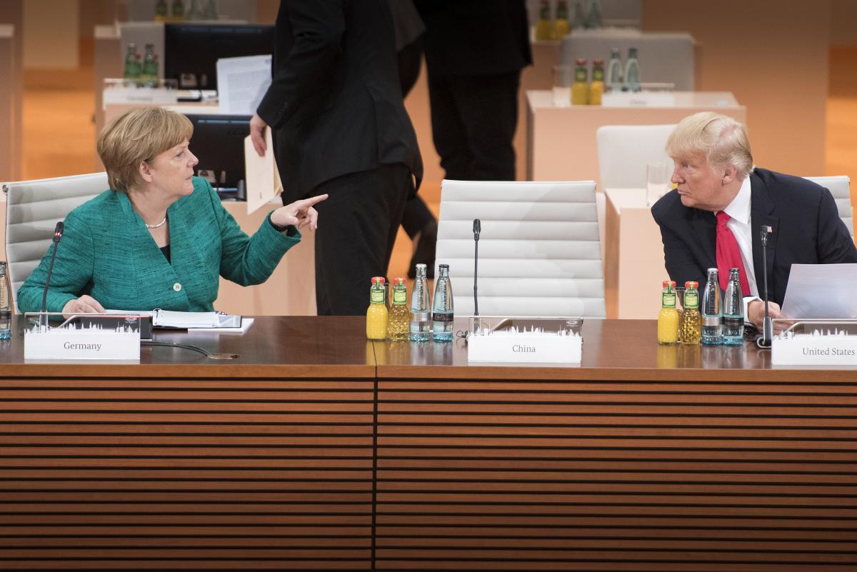 Merkel in conversation with Trump in Hamburg. Photo: German Government/Bergmann