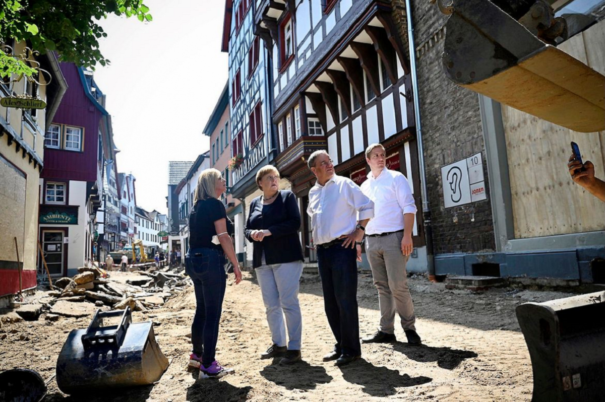 Angela Merkel visiting flood-hit Bad Münstereifel in North Rhine-Westphalia with state premier Armin Laschet. Photo: Bundesregierung/Steins.