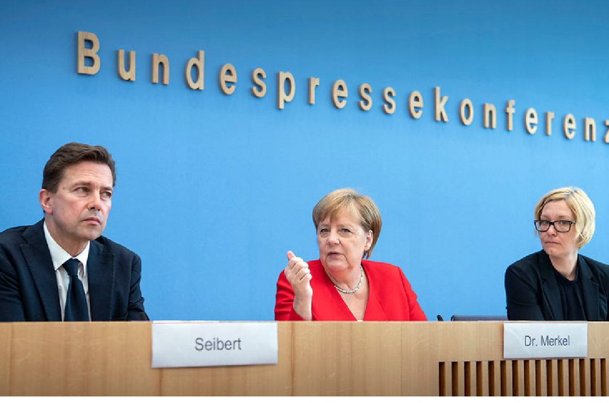 German Chancellor Merkel (center) at her annual press conference in Berlin. Photo - Bundesregierung/Bergmann 