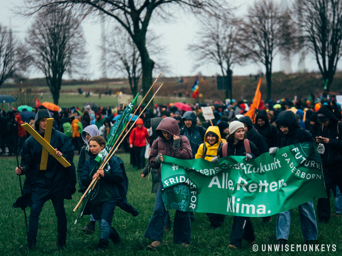Image shows climate protesters on field near Lützerath, Germany in January 2023. Image:  Lützi lebt/Unwisemonkeys
