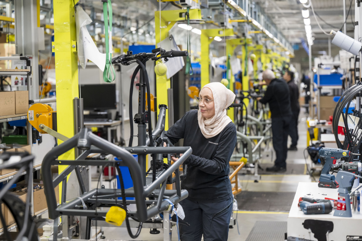 Picture shows e-bike assembly line