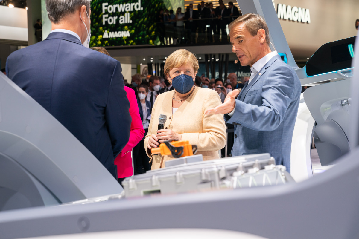 ‘Auto industry chancellor’ Merkel at the opening of the 2021 car show IAA with supplier BOSCH CEO Volkmar Denner. Photo: IAA Mobility 2021 / Oliver Tamagnini. German chancellor Merkel at IAA auto show 2021 with Bosch CEO Volkmar Denner. Photo: IAA Mobility 2021 / Oliver Tamagnini.