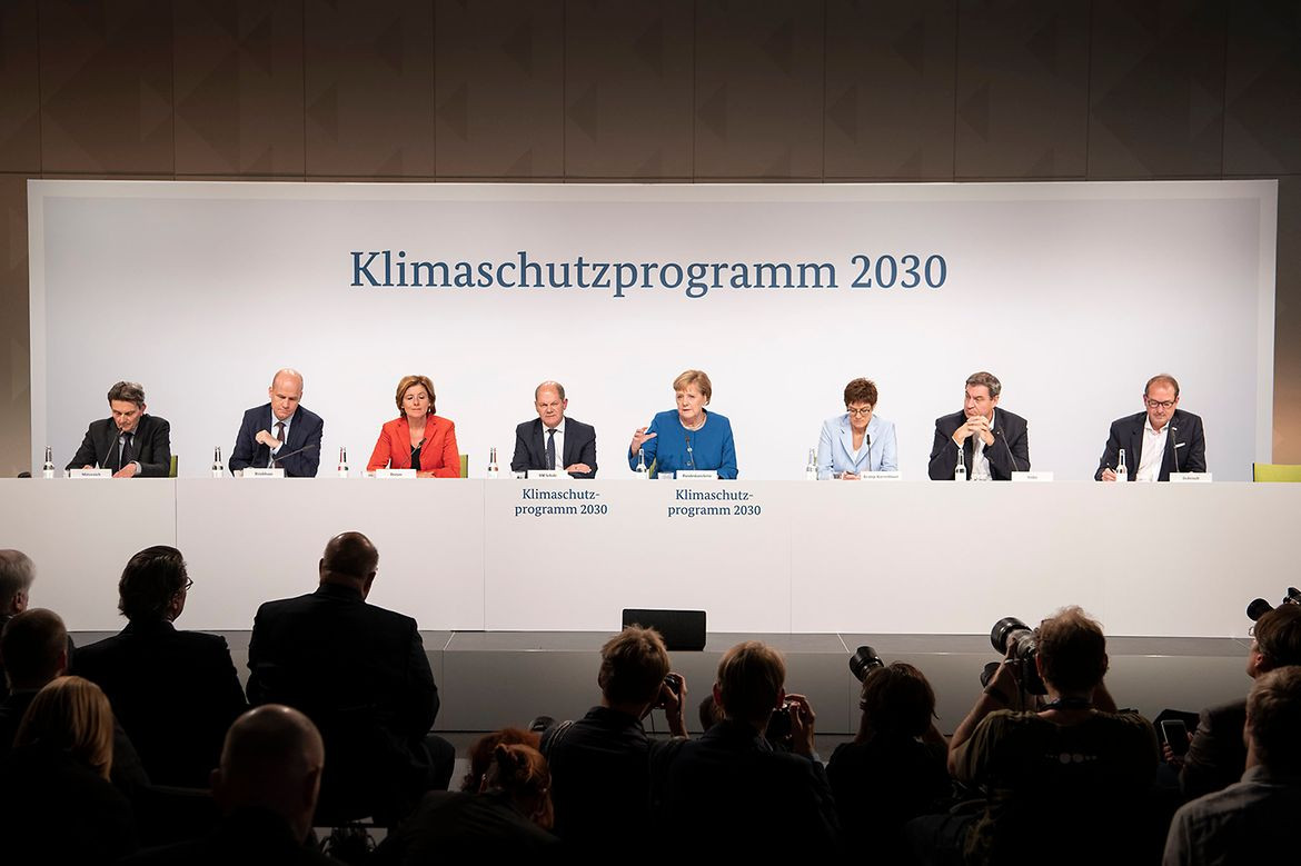 Merkel and other leading policymakers present Germany's Climate Action Programme 2030 at the end of last year. Photo: Bundesregierung/Bergmann