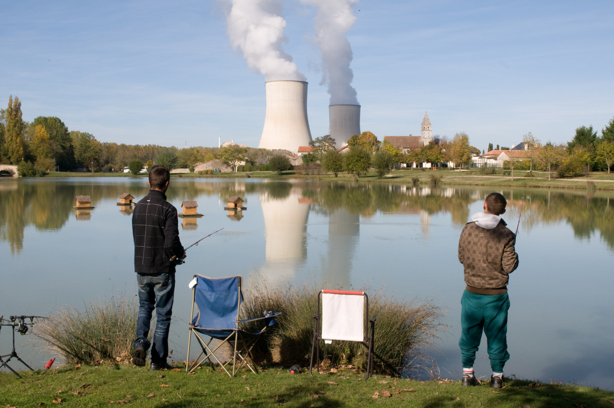 Picture shows fishermen near French nuclear plant