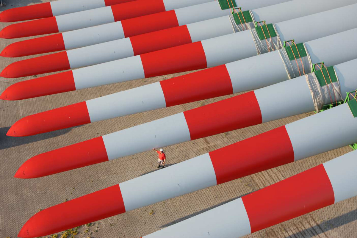 A row of wind turbines awaiting installation. 